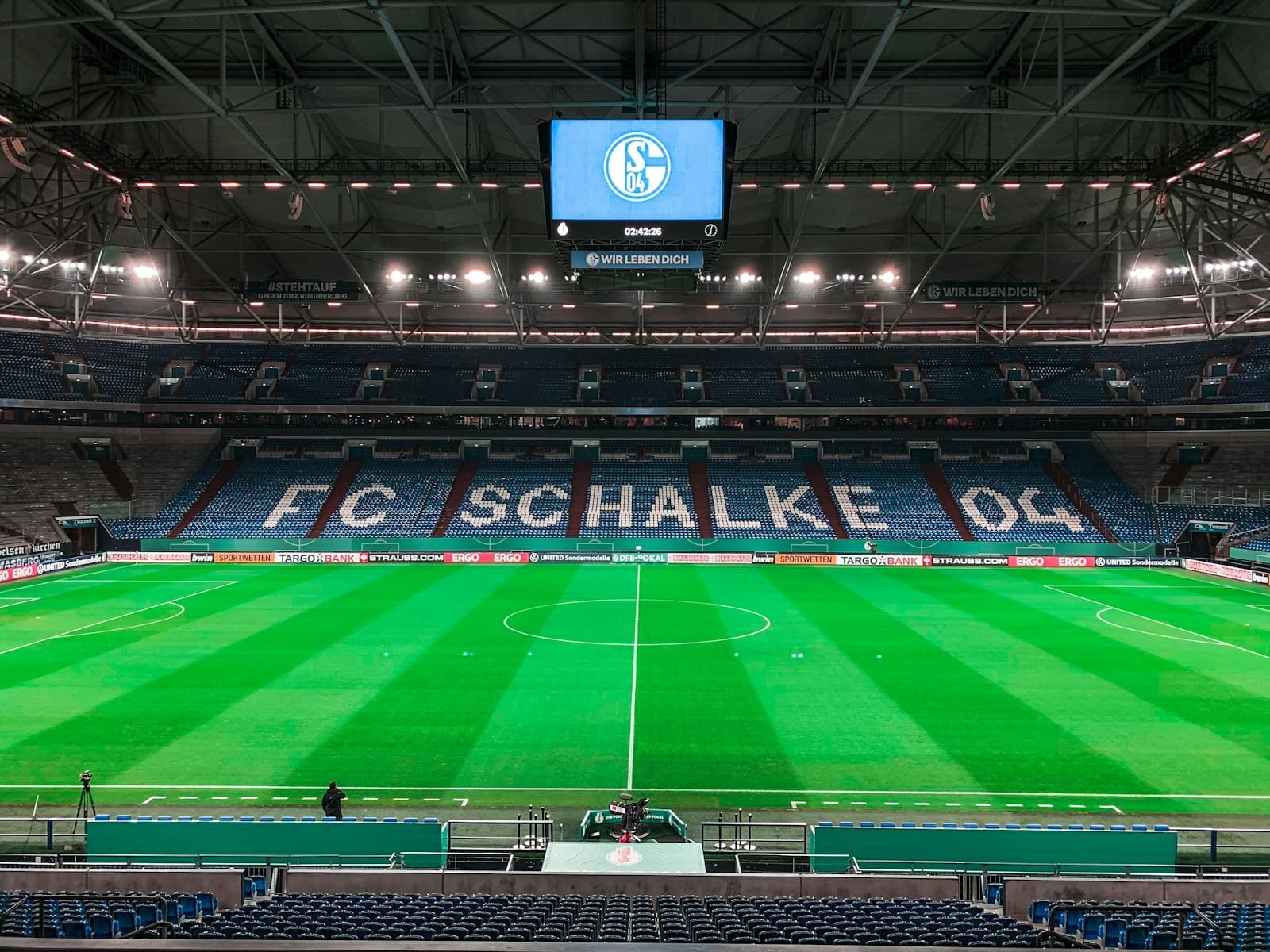 Football match under stadium lights